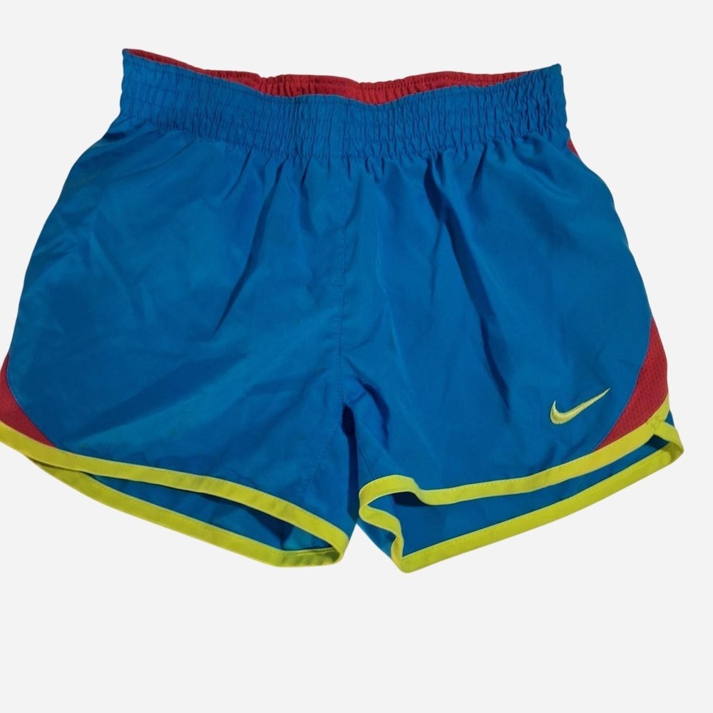 Girls Nike Dri-Fit blue shorts with red side panels and neon yellow trim